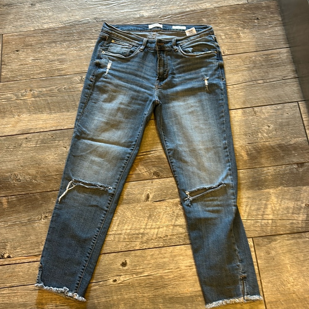 Distressed jeans size 8/29 frayed edges holes in both knees. Stretchy